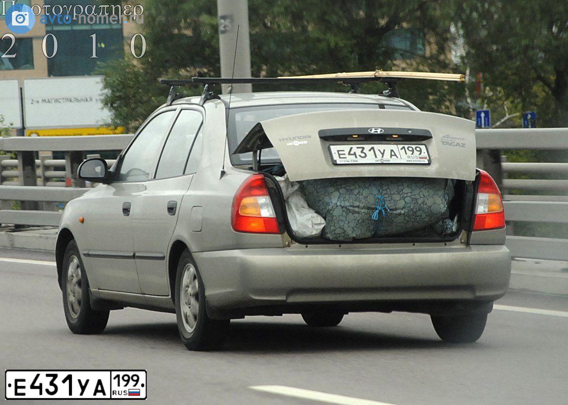 Фото автомобиля TAGAZ ACCENT, 2009 — госномер Е431УА199. Цвет: БЕЖЕВЫЙ