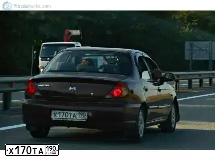Фото автомобиля KIA SPECTRA, 2007 — госномер Х170ТА190. Цвет: Красный