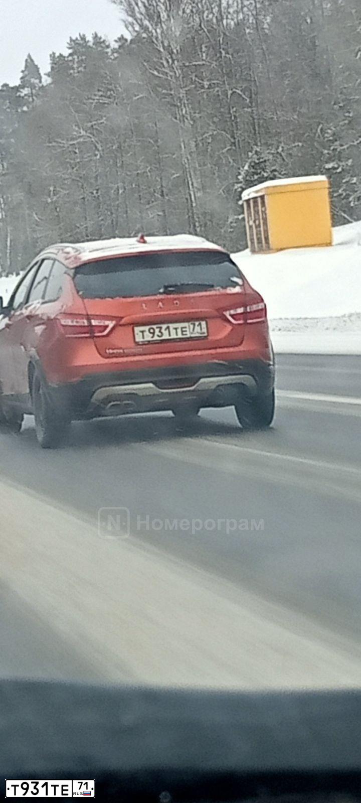 Фото автомобиля LADA VESTA, 2019 — госномер Т931ТЕ71. Цвет: ОРАНЖЕВЫЙ