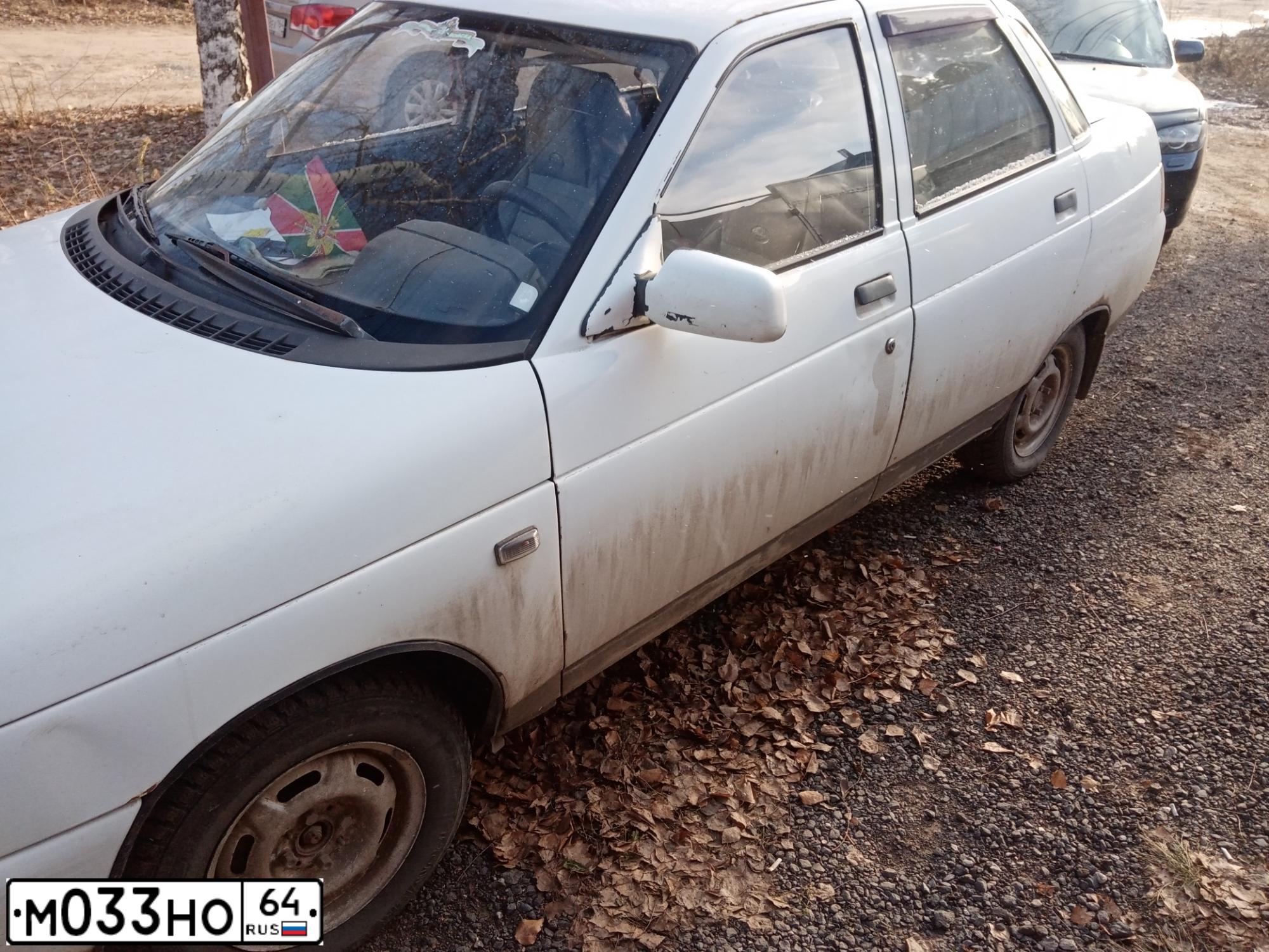 Фото автомобиля LADA 2110, 2001 — госномер М033НО64. Цвет: ЯРКО БЕЛЫЙ