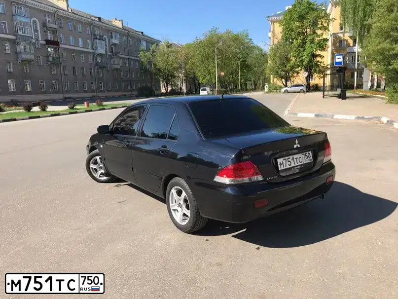 Фото автомобиля MITSUBISHI LANCER, 2007 — госномер М751ТС750. Цвет: ЧЕРНЫЙ