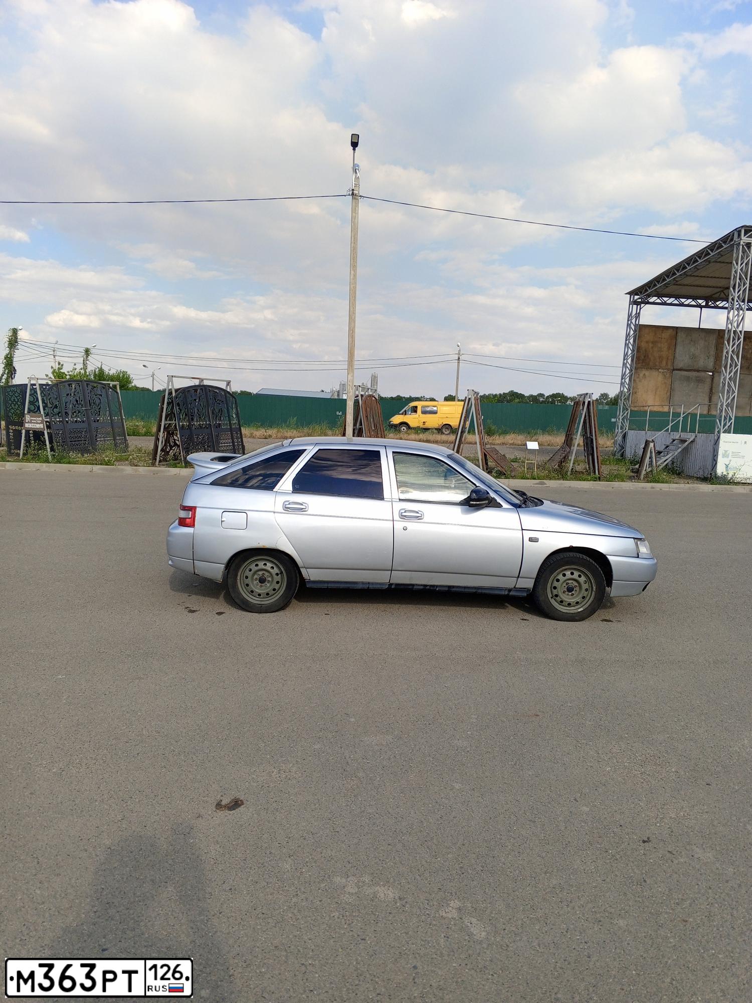 Фото автомобиля LADA 2112, 2004 — госномер Е148НТ08