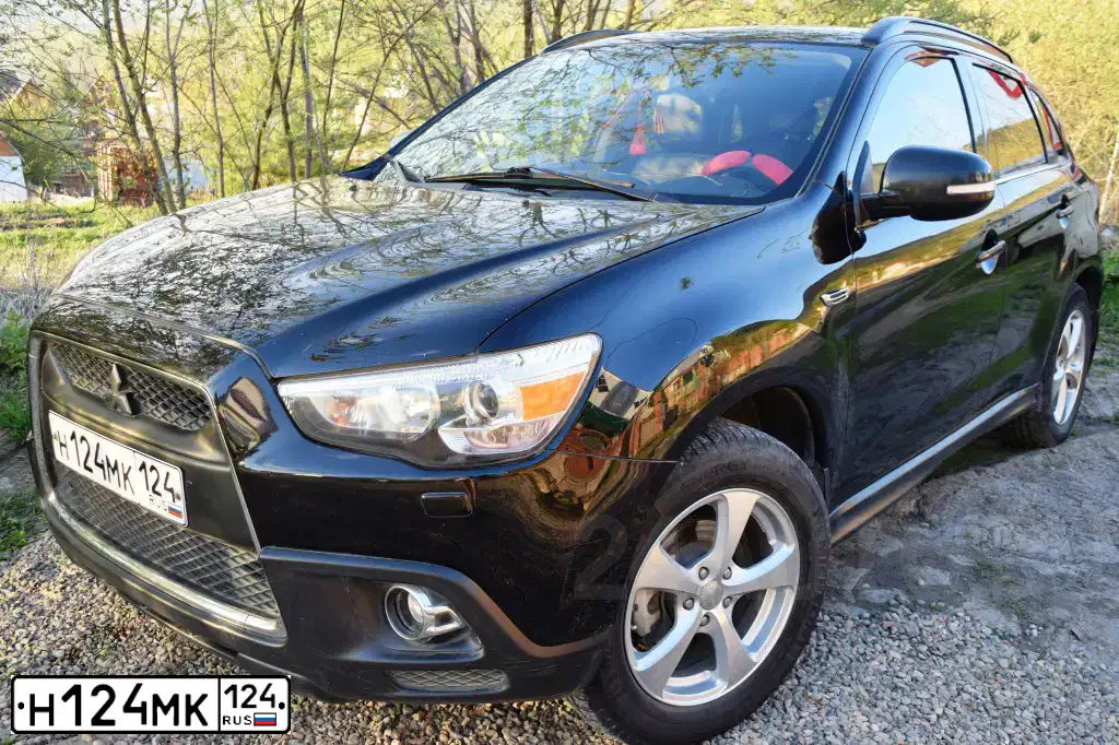 Фото автомобиля MITSUBISHI ASX, 2010 — госномер Н124МК124. Цвет: ЧЕРНЫЙ