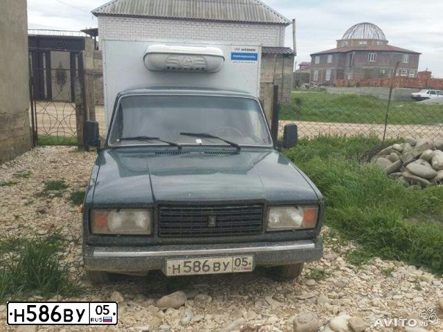 Фото автомобиля LADA 2345 WIS, 2008 — госномер Н586ВУ05. Цвет: Темно-зеленый