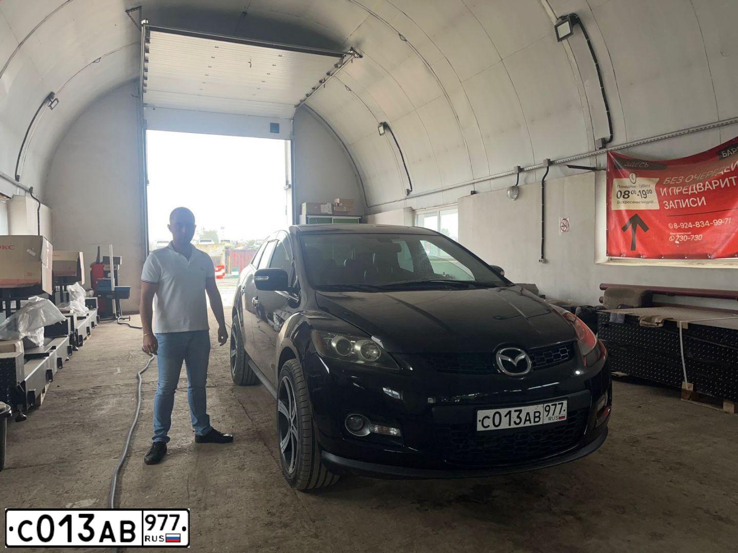 Фото автомобиля MAZDA CX-7, 2008 — госномер В234МЕ138. Цвет: ЧЕРНЫЙ