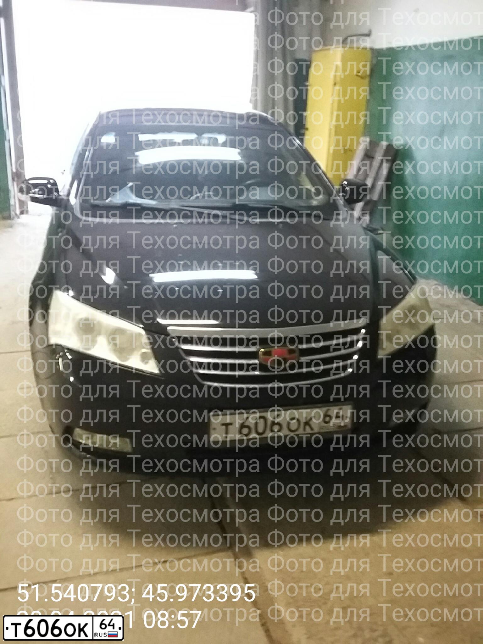 Фото автомобиля GEELY EMGRAND, 2013 — госномер Т606ОК64. Цвет: ЧЕРНЫЙ