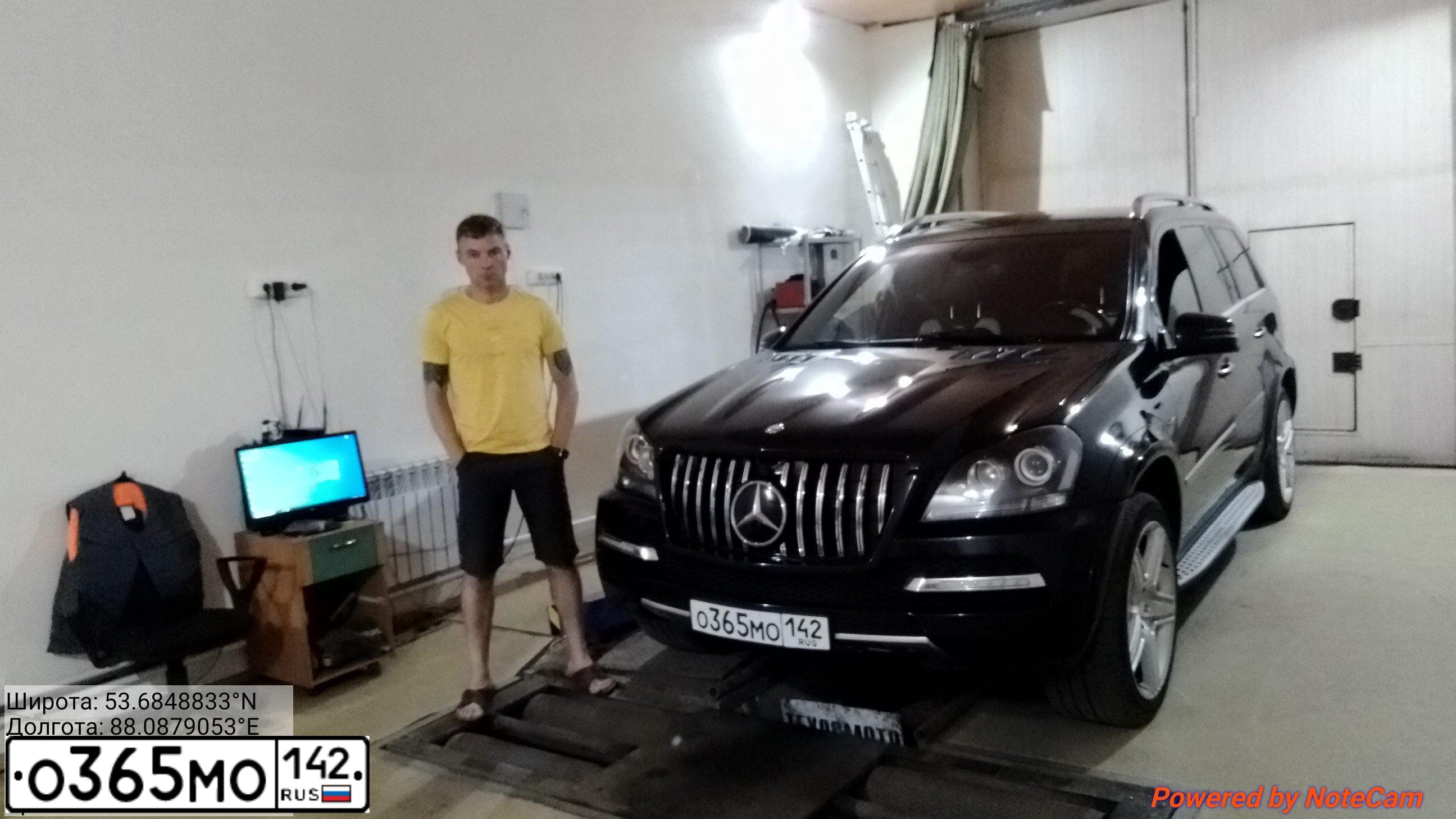 Фото автомобиля MERCEDES GL-KLASSE, 2012 — госномер Н002ТМ199. Цвет: ЧЕРНЫЙ