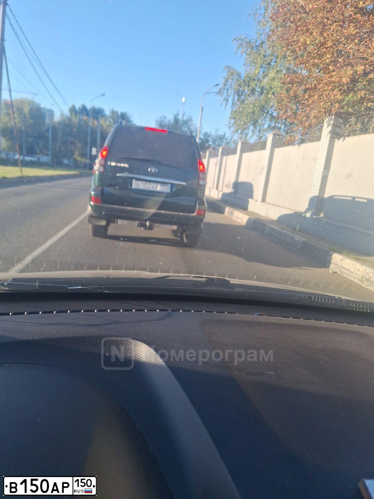 Фото автомобиля LADA 2112, 2003 — госномер В150АР150. Цвет: Темно-зеленый
