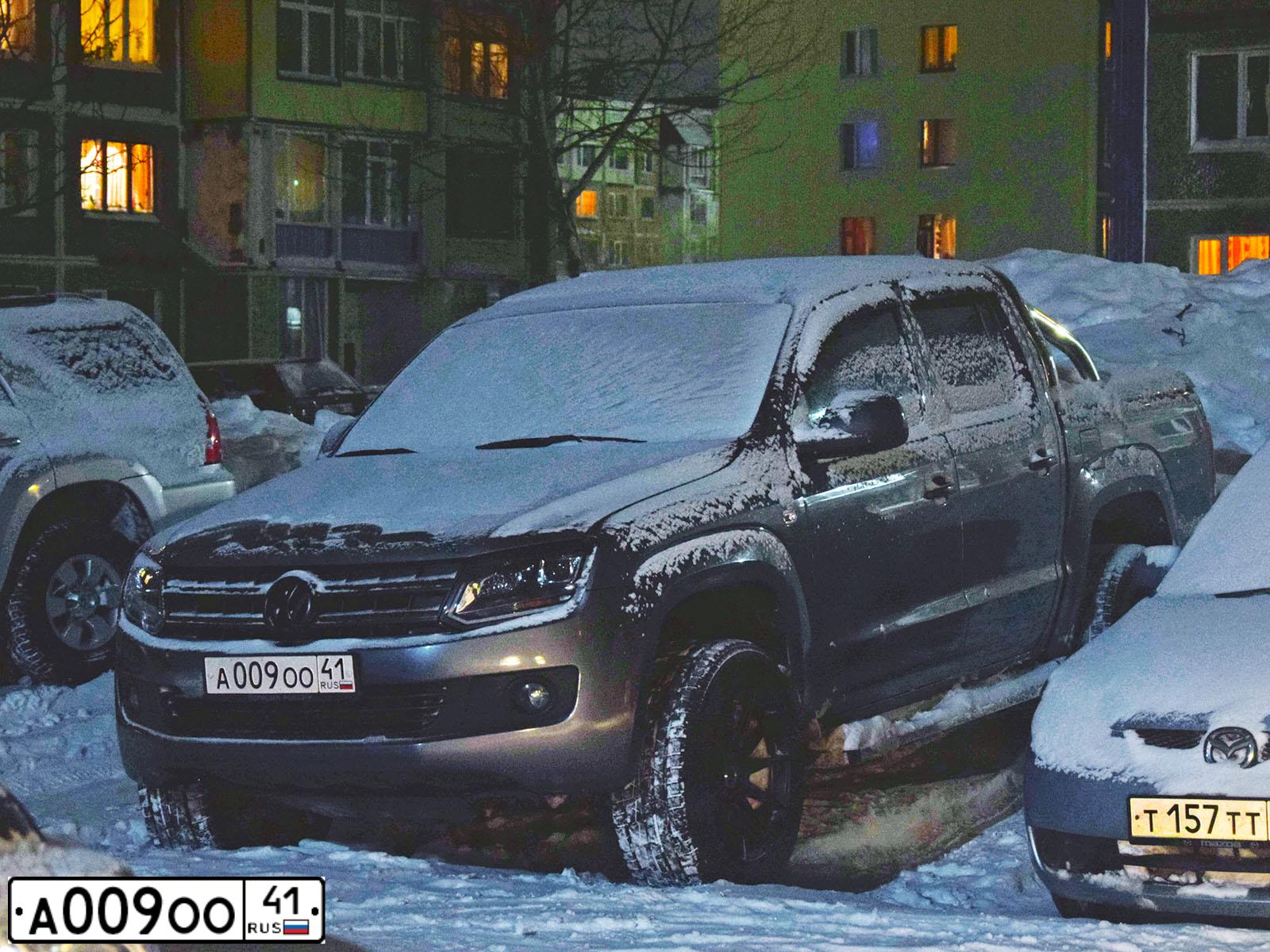 Фото автомобиля VOLKSWAGEN AMAROK, 2011 — госномер Е545ЕВ01. Цвет: Серый