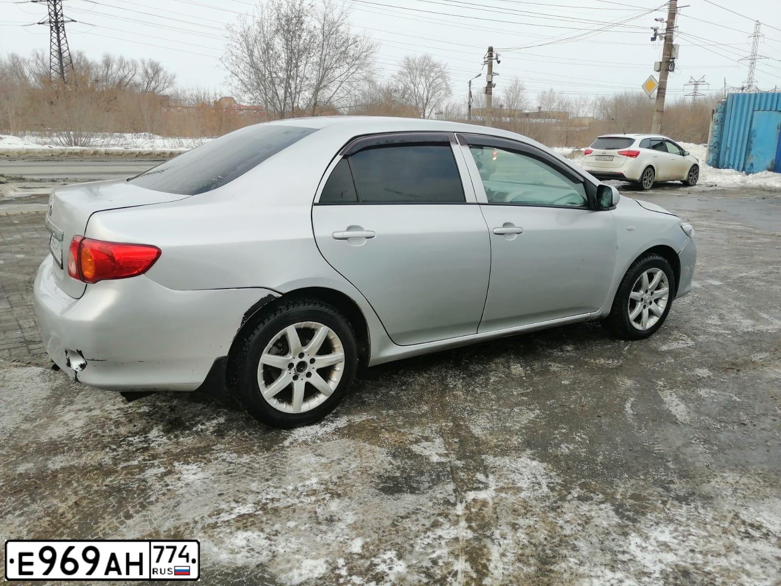 Фото автомобиля TOYOTA COROLLA, 2007 — госномер Т343ОТ35. Цвет: Серебристый
