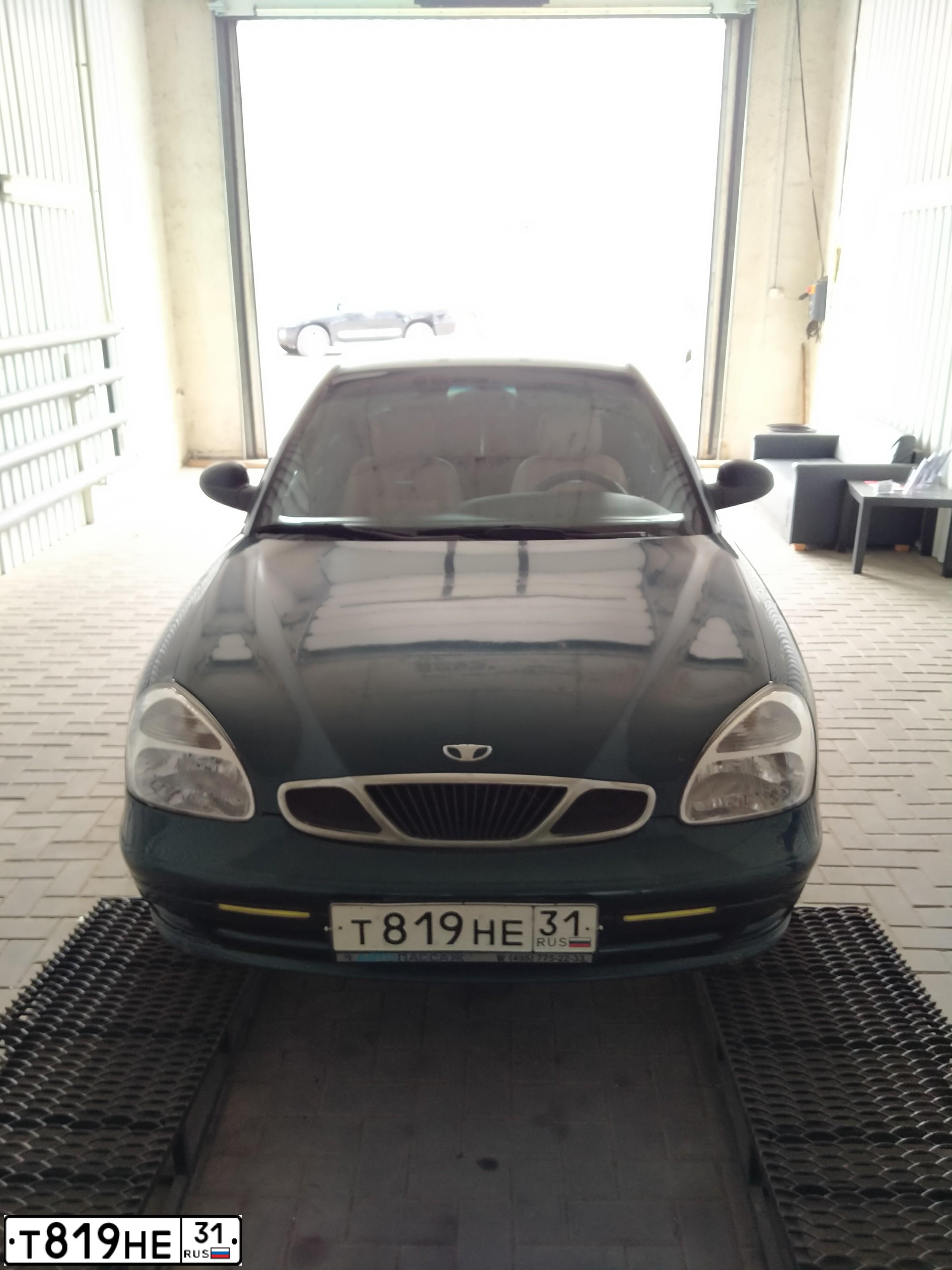 Фото автомобиля DAEWOO NUBIRA, 2000 — госномер Т819НЕ31. Цвет: ЗЕЛЕНЫЙ