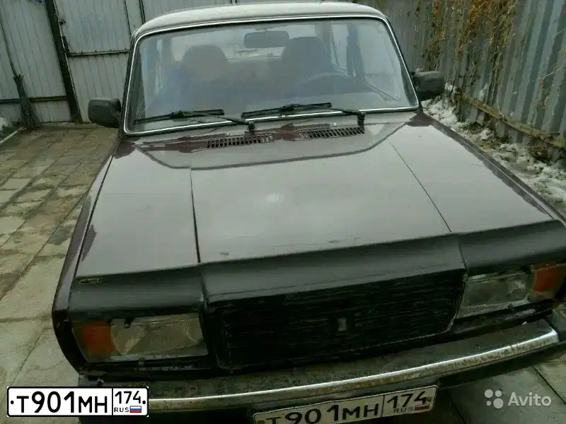Фото автомобиля LADA 2107 LADA, 2007 — госномер О497ТХ174. Цвет: ТЕМНО-ВИШНЕВЫЙ