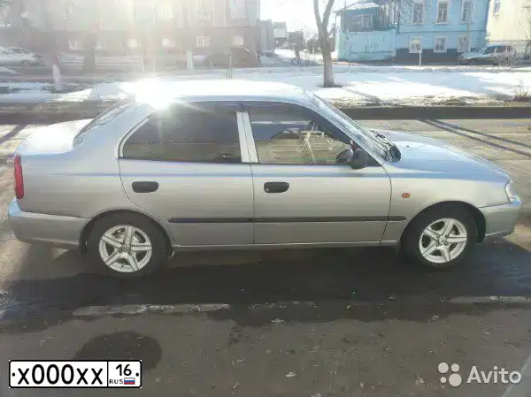 Фото автомобиля LADA 21099, 2003 — госномер Е238УТ186