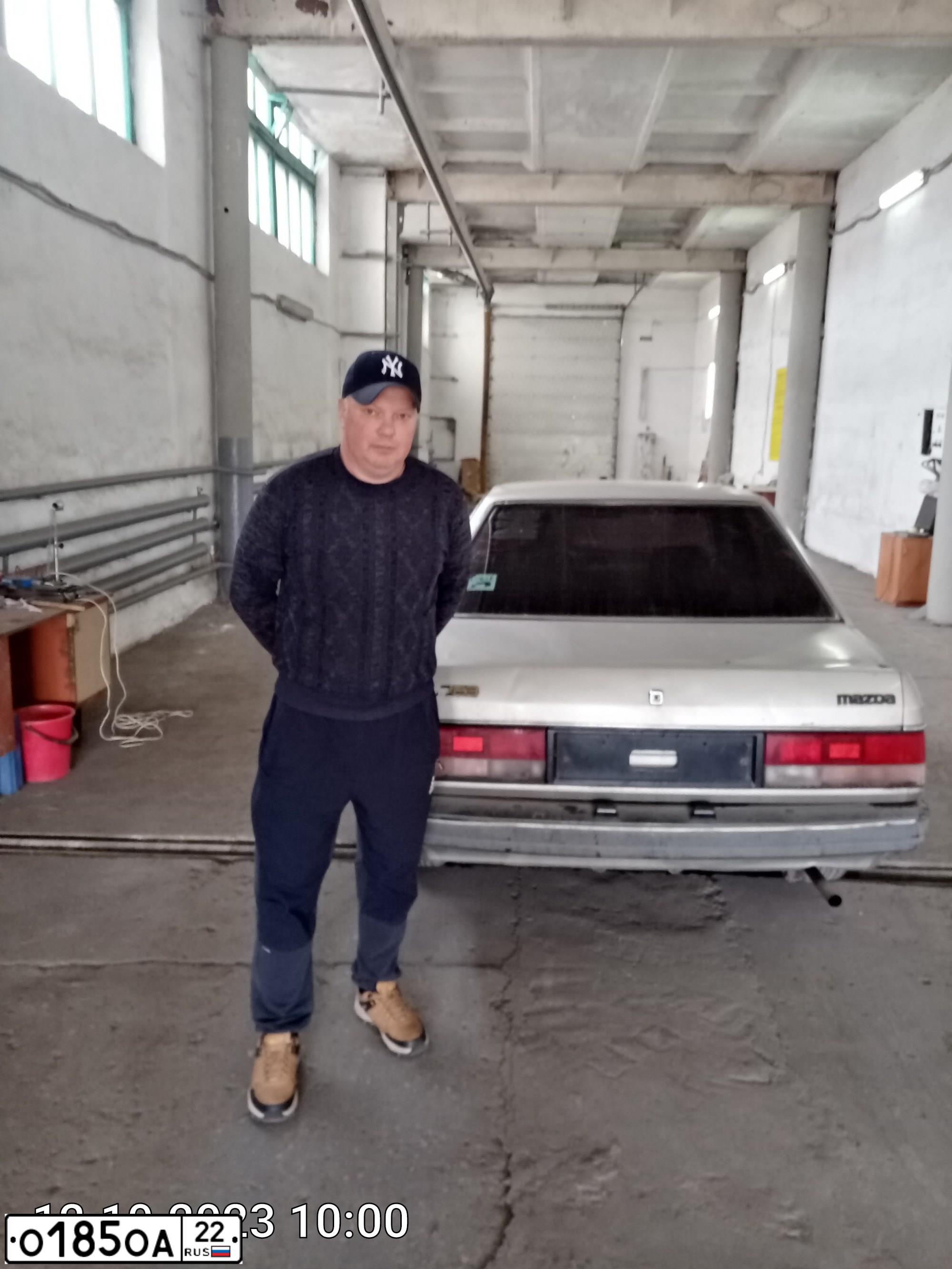 Фото автомобиля МАЗДА 323, 1990 — госномер В119ХС122