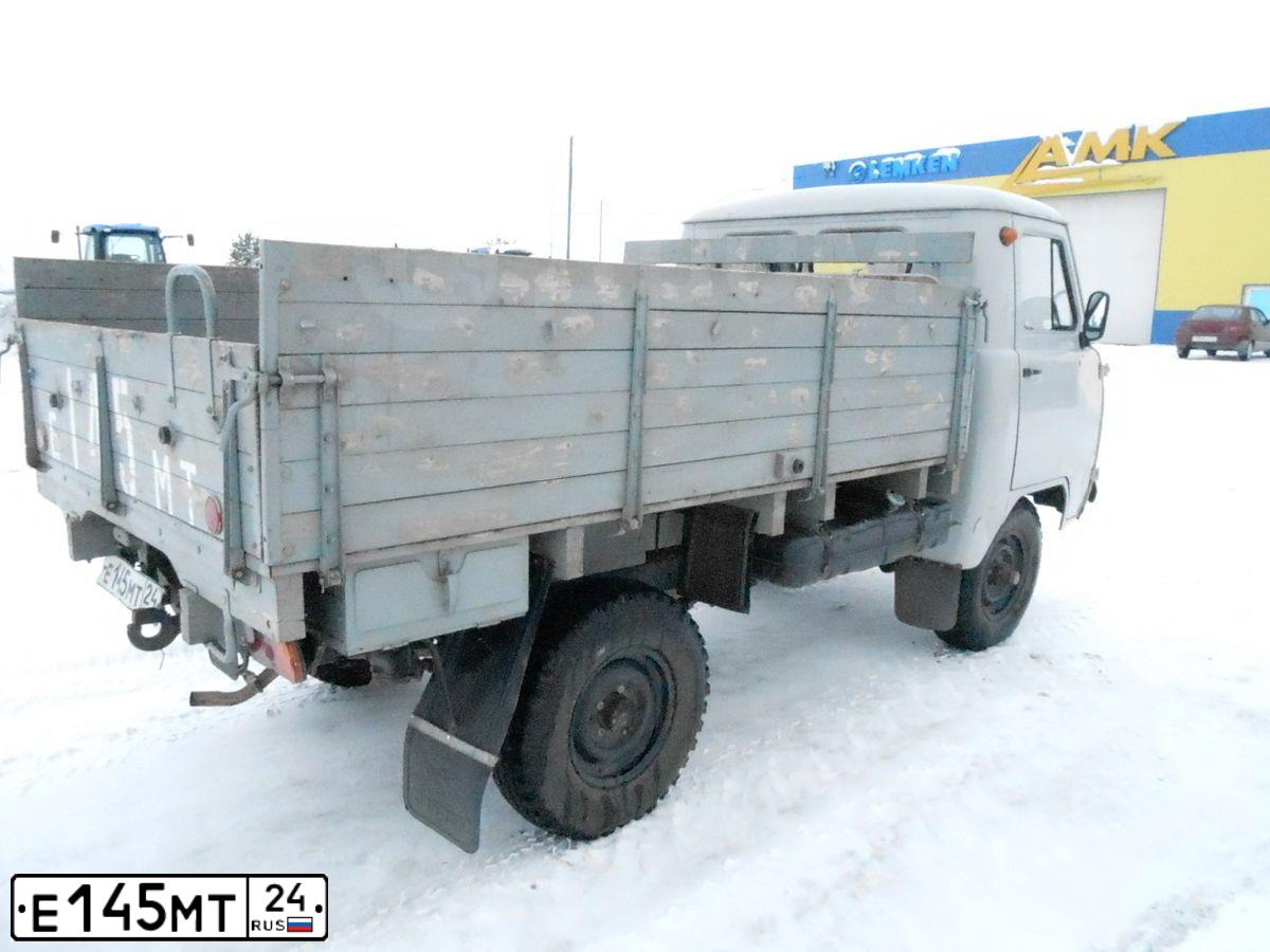 Фото автомобиля UAZ 3303, 2002 — госномер Е145МТ24. Цвет: БЕЛЫЙ