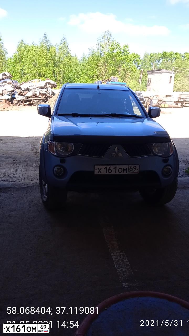 Фото автомобиля MITSUBISHI L 200, 2007 — госномер Х161ОМ69. Цвет: СВЕТЛО-СЕРО-ЗЕЛЕНЫЙ