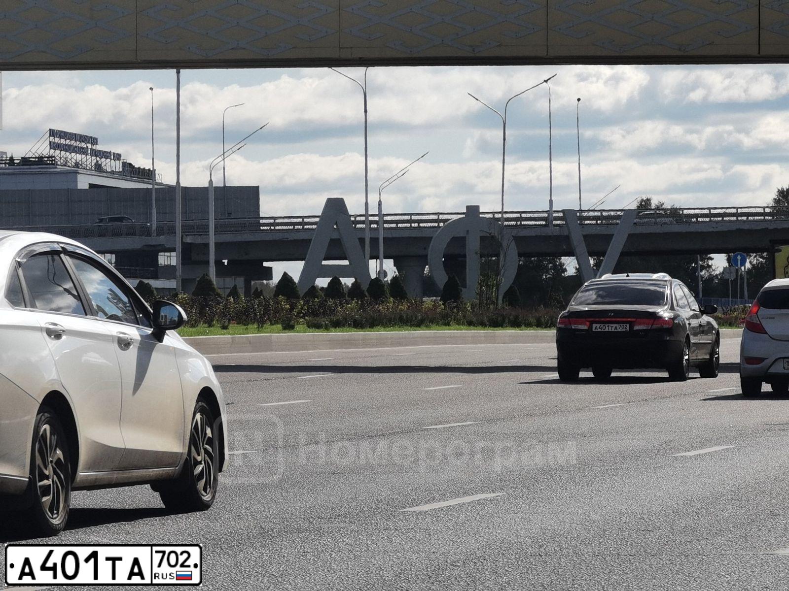 Фото автомобиля HYUNDAI GRANDEUR, 2007 — госномер Е050УК116. Цвет: ЧЕРНЫЙ