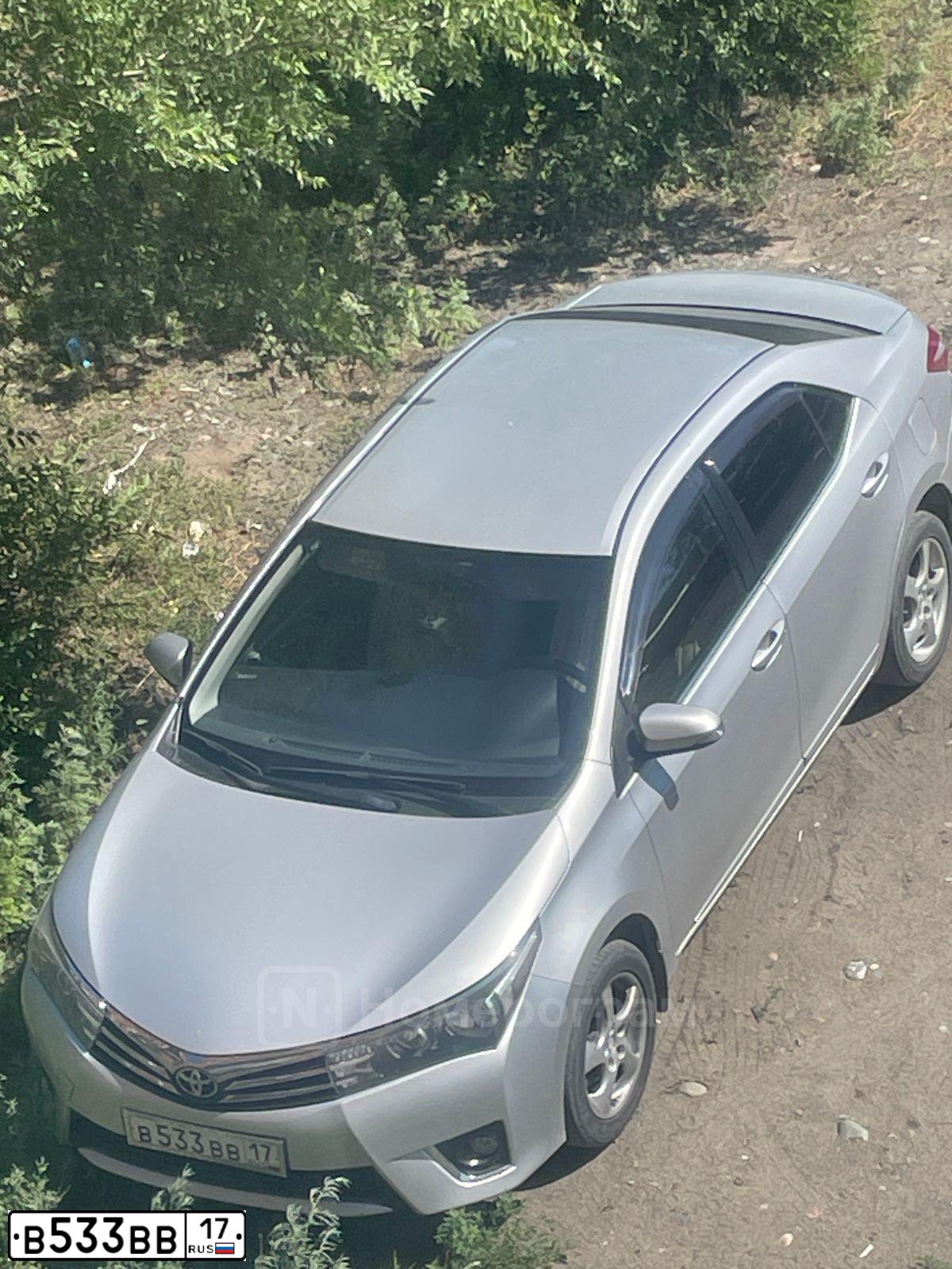 Фото автомобиля TOYOTA COROLLA, 2014 — госномер В533ВВ17. Цвет: СЕРЕБРИСТЫЙ