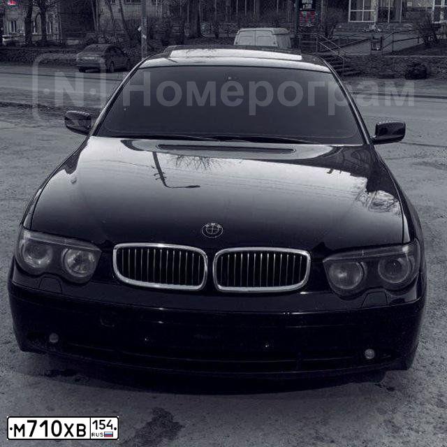 Фото автомобиля BMW SERIE 7, 2004 — госномер М710ХВ154. Цвет: ЧЕРНЫЙ
