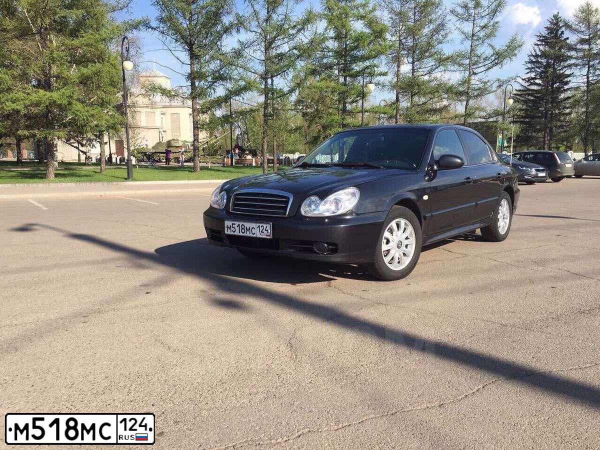 Фото автомобиля TAGAZ SONATA, 2011 — госномер М518МС124. Цвет: ЧЕРНЫЙ