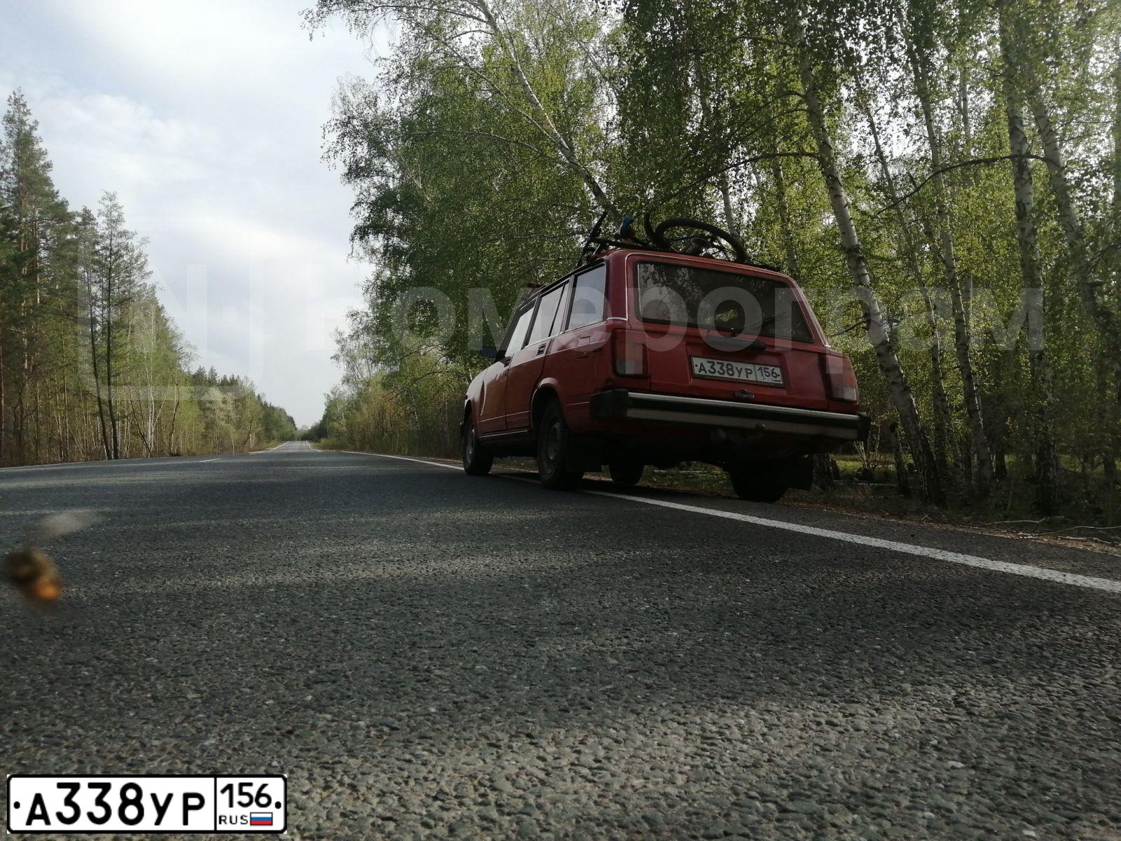 Фото автомобиля LADA 2104, 1998 — госномер А338УР156. Цвет: Красный