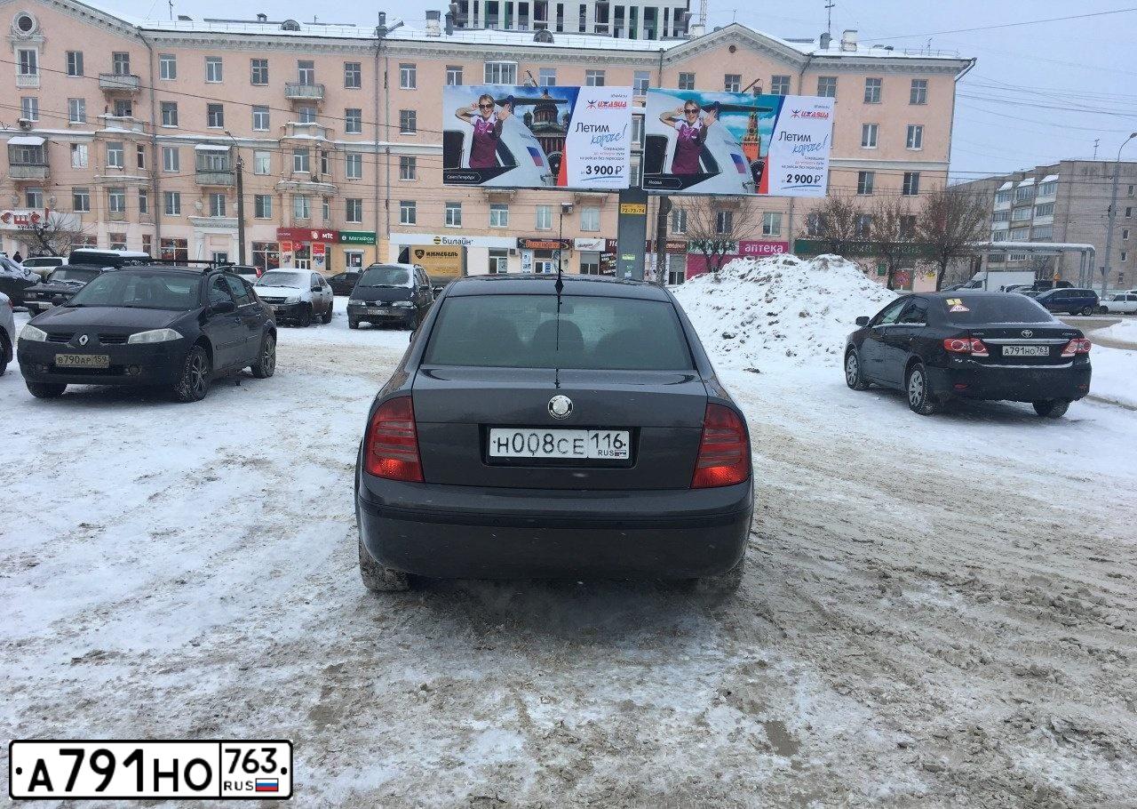 Фото автомобиля TOYOTA COROLLA, 2011 — госномер В009МВ163. Цвет: ЧЕРНЫЙ