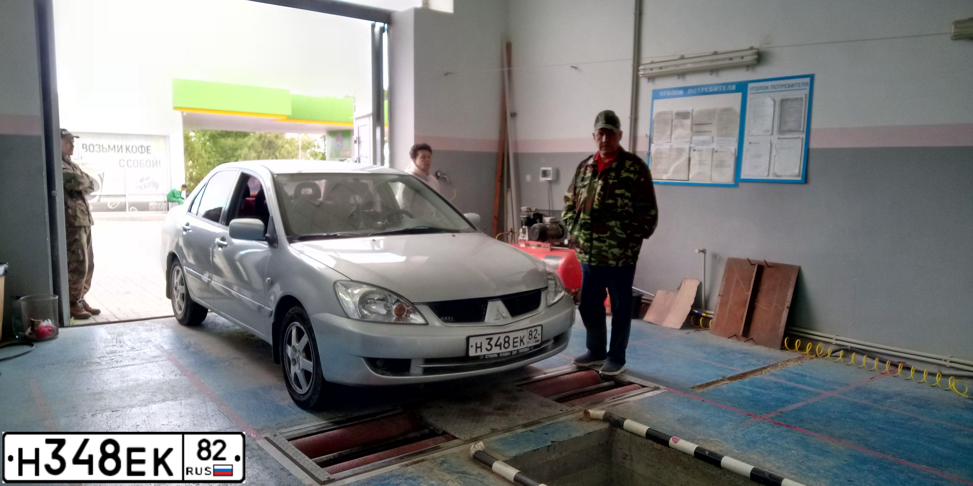 Фото автомобиля MITSUBISHI LANCER, 2005 — госномер Н348ЕК82. Цвет: СЕРЕБРИСТЫЙ