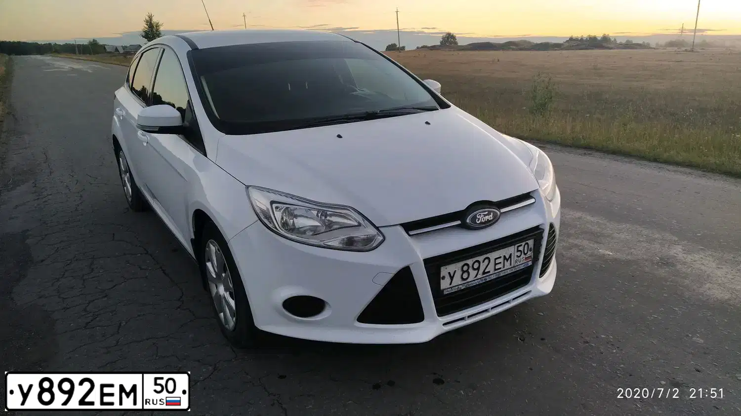 Фото автомобиля FORD FOCUS, 2013 — госномер Н574УТ174. Цвет: Белый