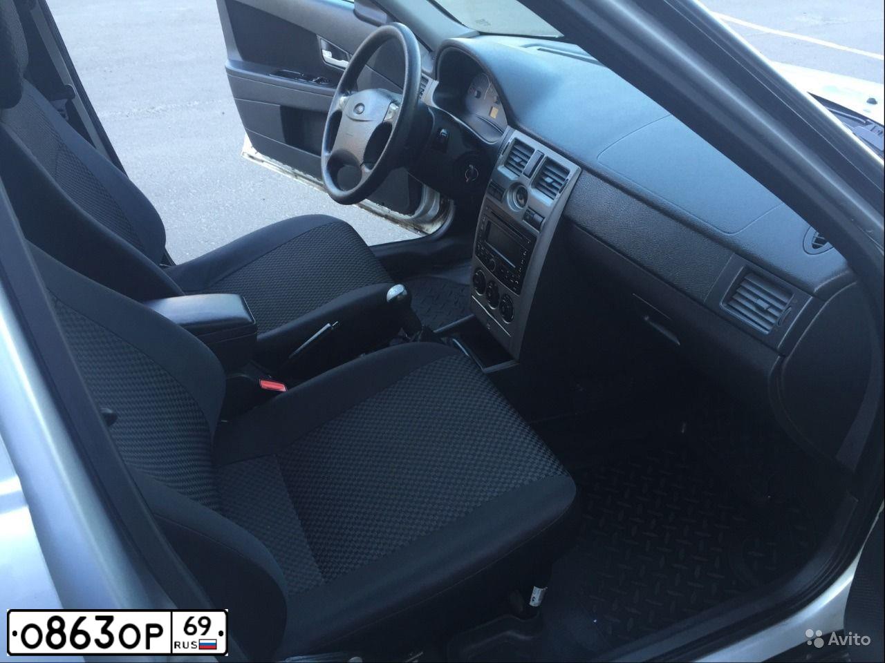 Фото автомобиля FORD FOCUS, 2011 — госномер Н830СМ69. Цвет: СЕРО-КОРИЧНЕВЫЙ