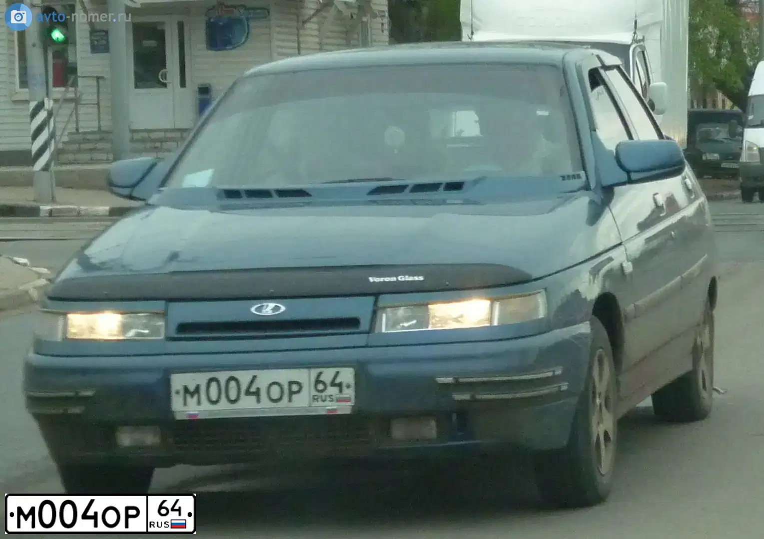 Фото автомобиля LADA 2110 LADA, 2004 — госномер В026НВ164. Цвет: СИНЕ ЗЕЛЕНЫЙ