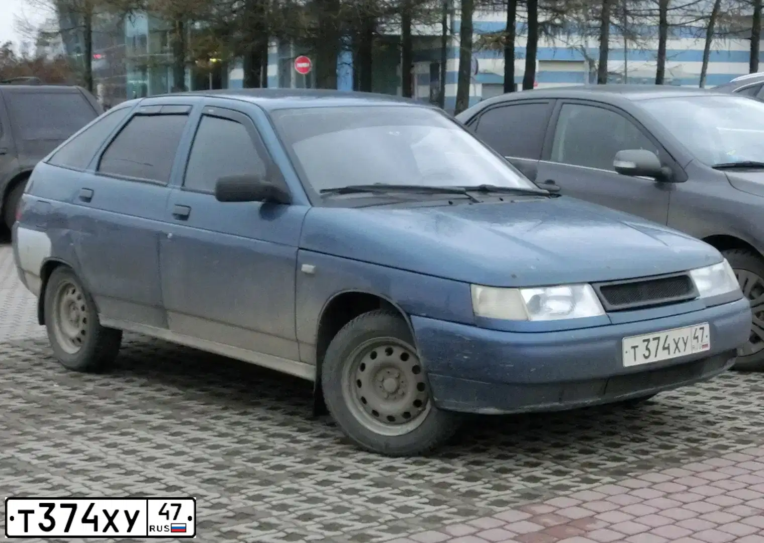 Фото автомобиля LADA 2112, 2004 — госномер К381ВЕ53. Цвет: СИНЕ-ЗЕЛЕНЫЙ
