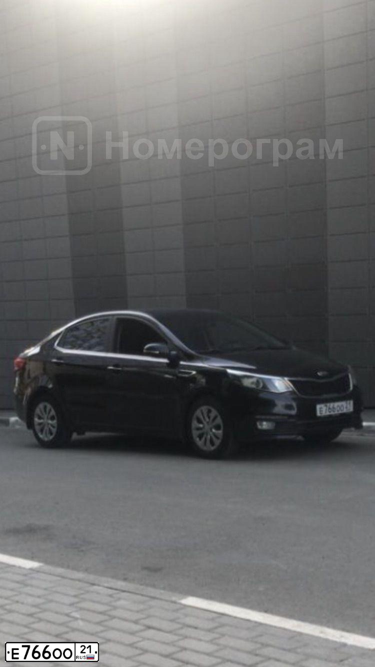 Фото автомобиля KIA RIO, 2016 — госномер М323ТО21. Цвет: ЧЕРНЫЙ