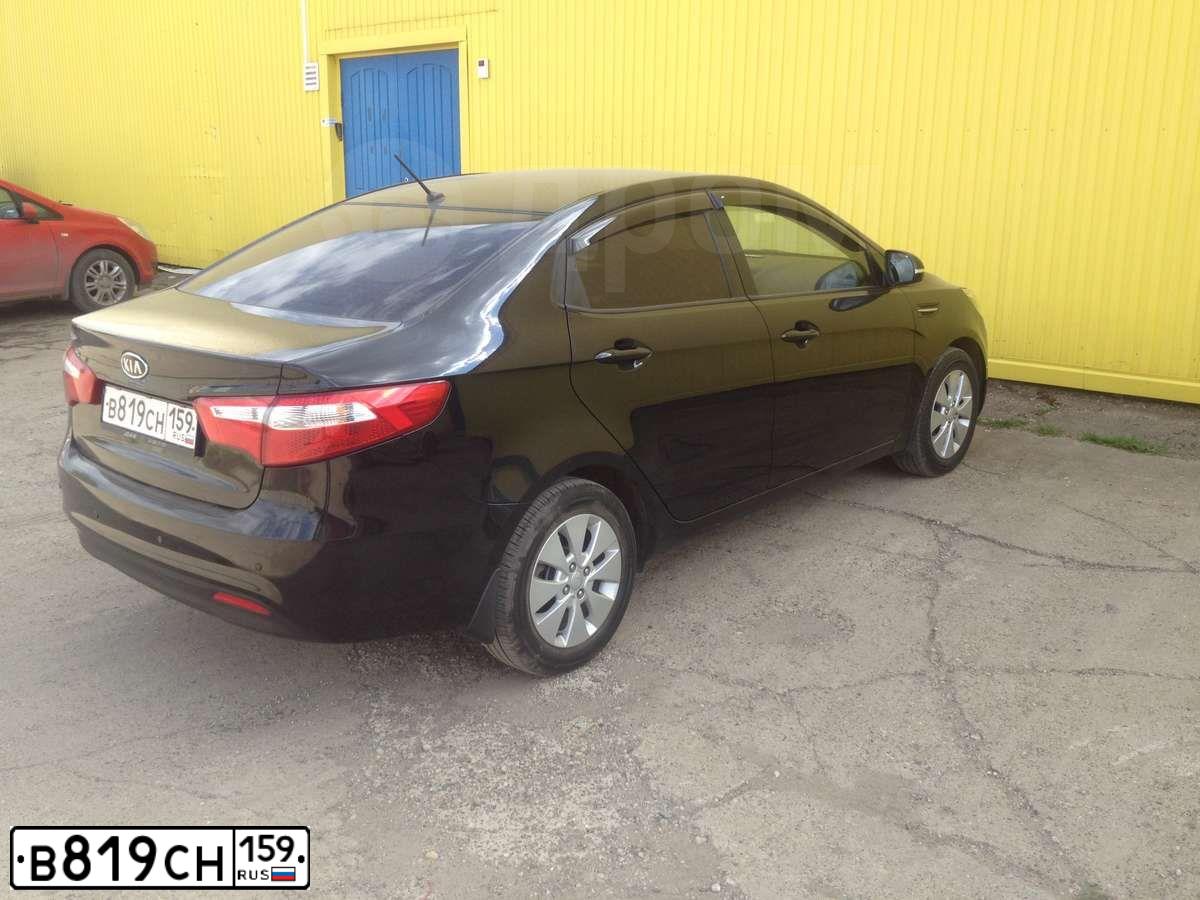 Фото автомобиля KIA RIO, 2013 — госномер В819СН159. Цвет: ЧЕРНЫЙ