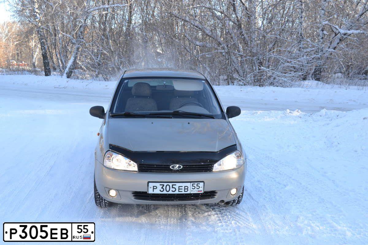 Фото автомобиля LADA 1118 KALINA, 2006 — госномер Р305ЕВ55. Цвет: БЕЖЕВО-СЕРЫЙ
