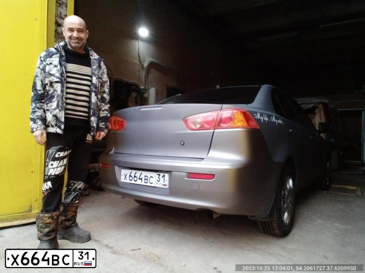 Фото автомобиля MITSUBISHI LANCER, 2007 — госномер Р212ЕР40. Цвет: СЕРЫЙ