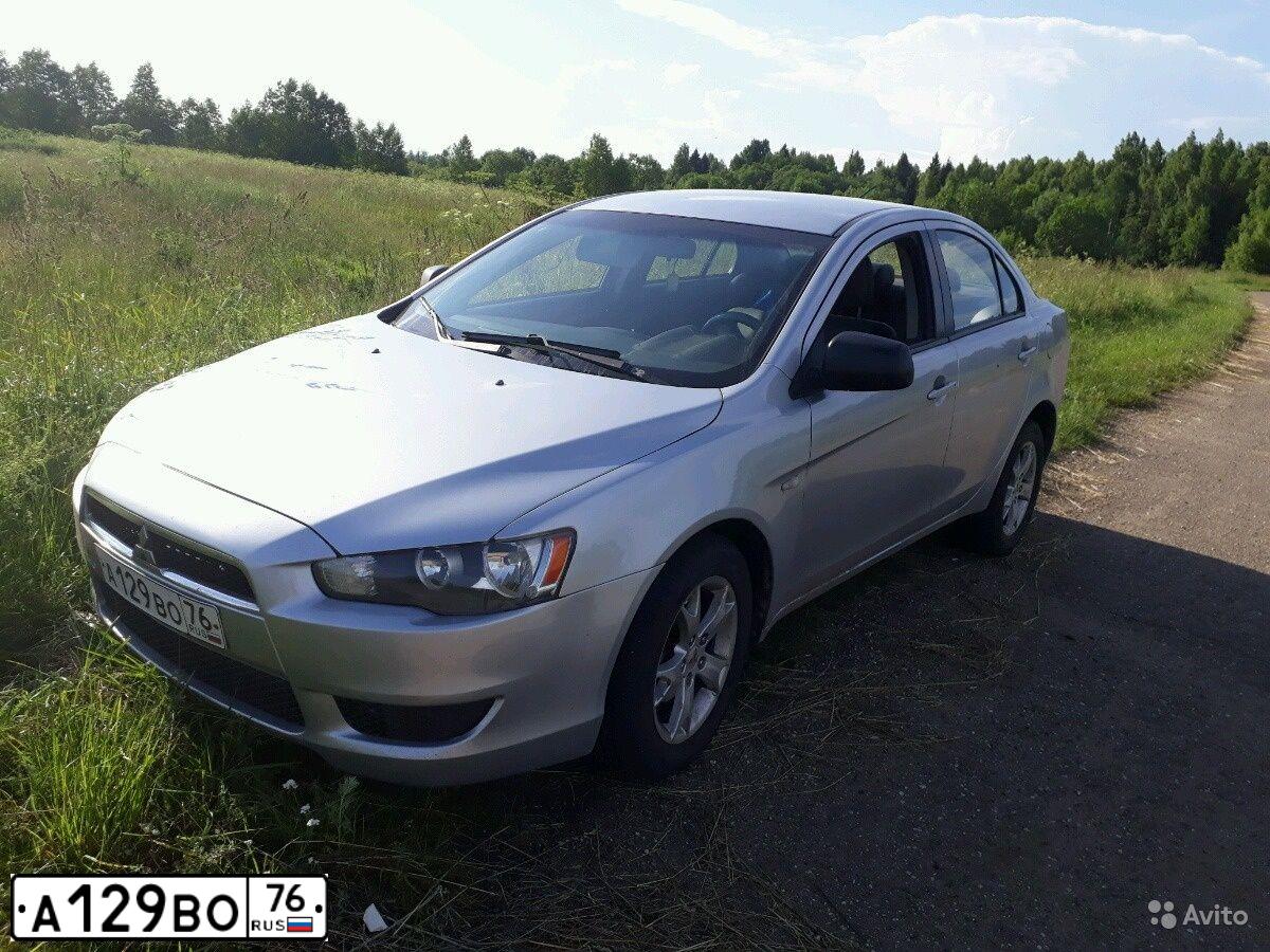 Фото автомобиля MITSUBISHI LANCER, 2008 — госномер А129ВО76. Цвет: СЕРЕБРИСТЫЙ