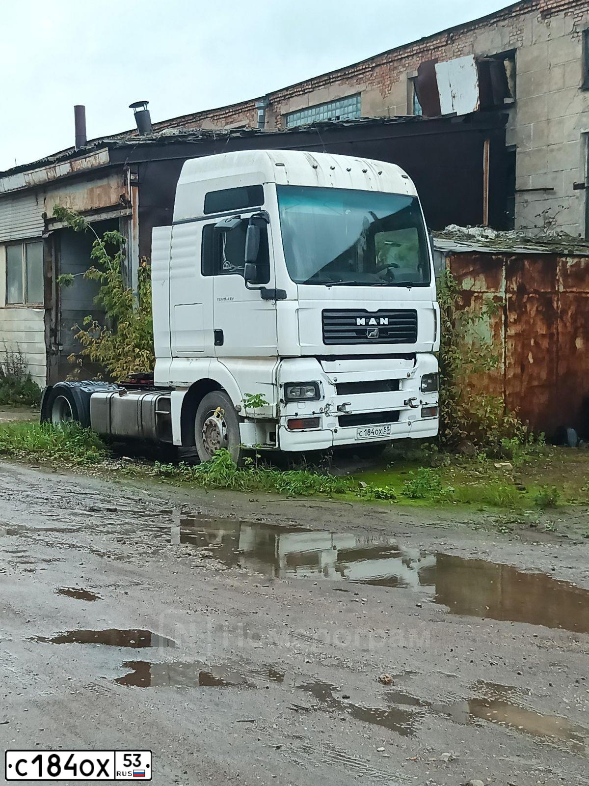 Фото автомобиля MAN TGA 18.XXX /4X2/, 2011 — госномер С184ОХ53. Цвет: БЕЛЫЙ