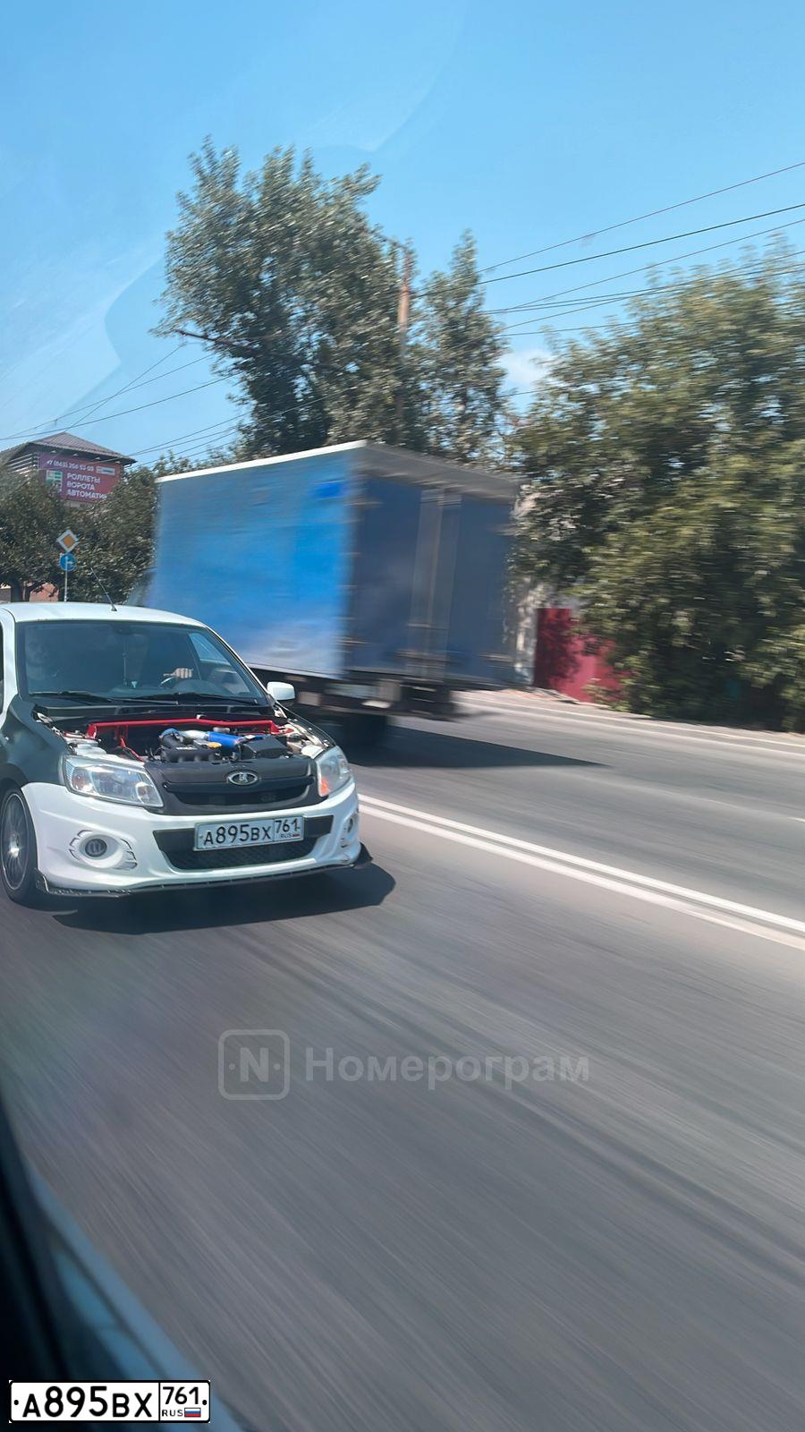 Фото автомобиля LADA 2190 GRANTA, 2015 — госномер Н944АХ32. Цвет: Белый