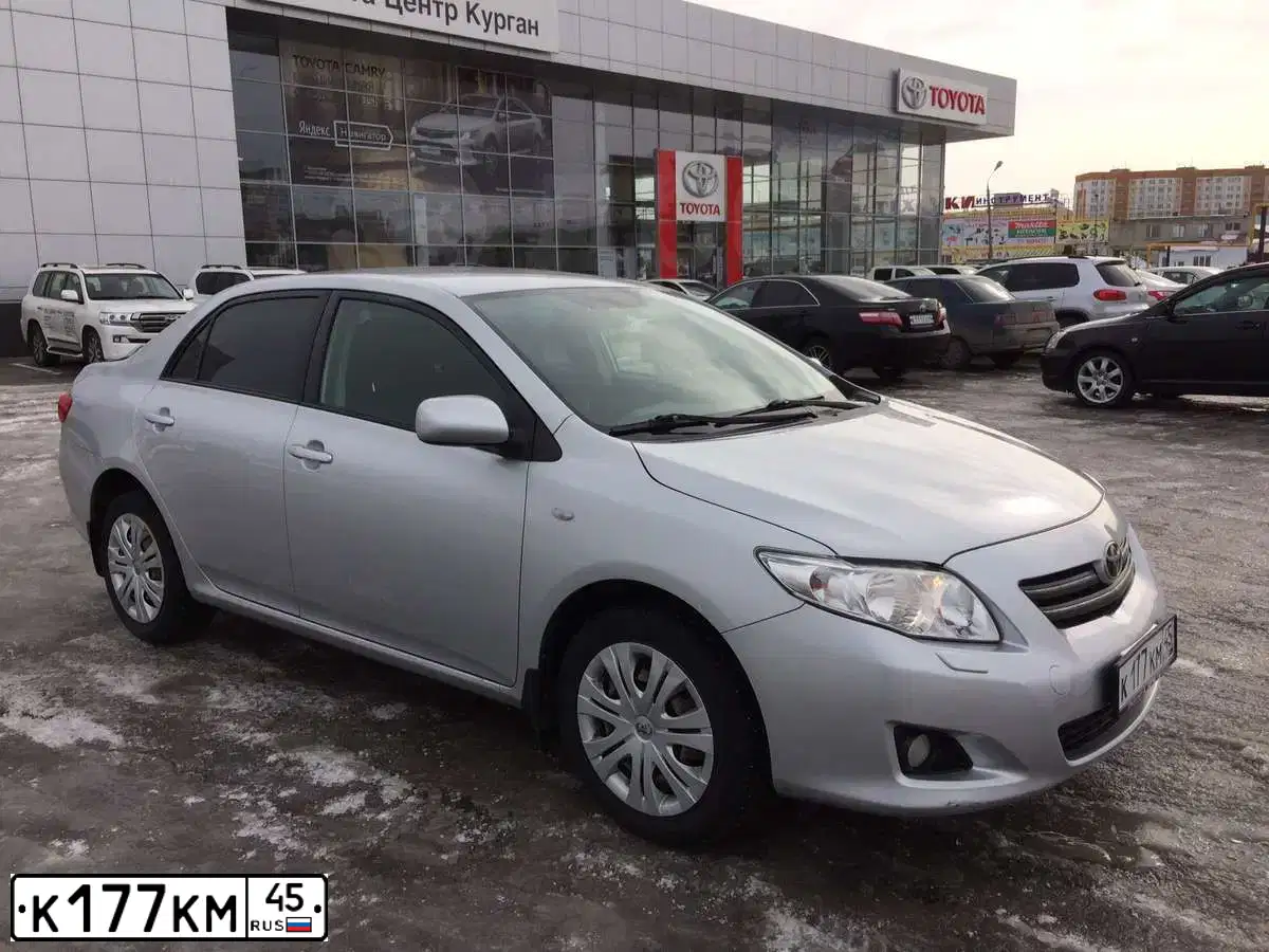 Фото автомобиля TOYOTA COROLLA, 2008 — госномер Н984НН45. Цвет: Серебристый