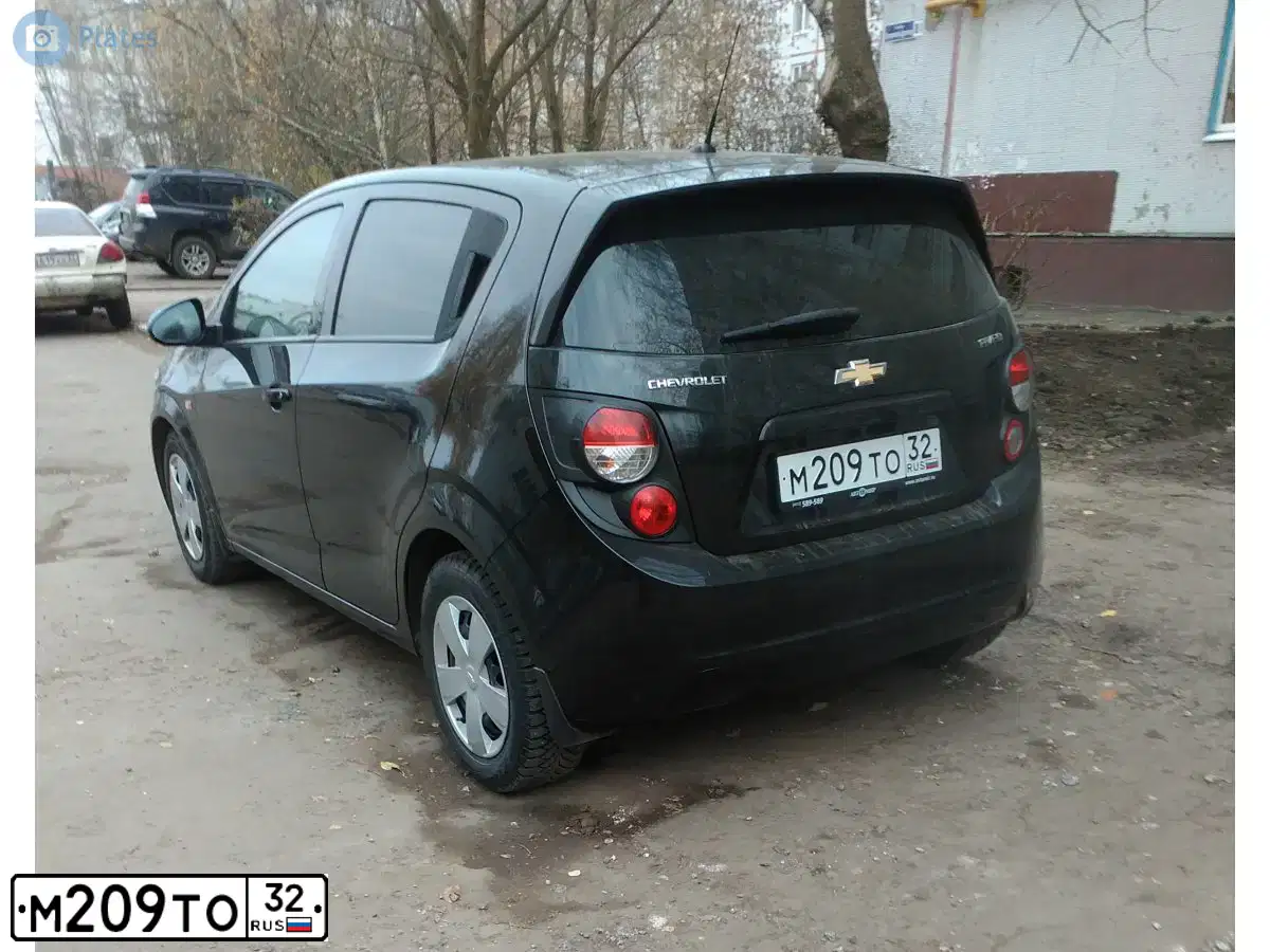 Фото автомобиля CHEVROLET T AVEO, 2013 — госномер М209ТО32. Цвет: ЧЕРНЫЙ-МЕТАЛЛИК