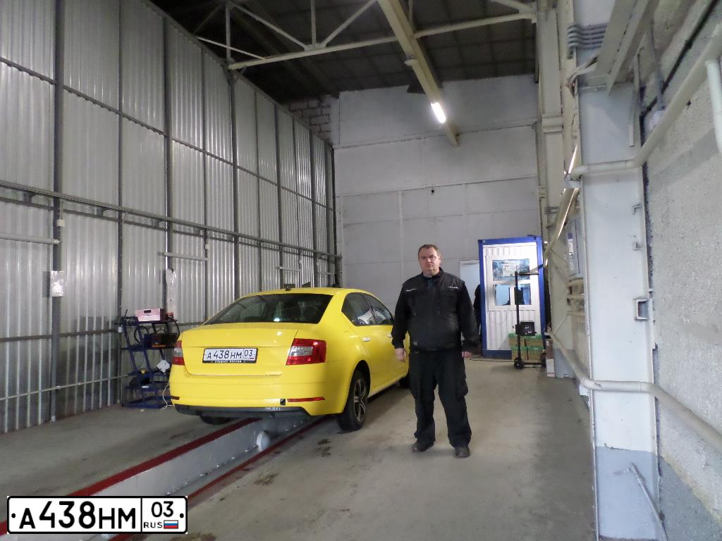 Фото автомобиля SKODA OCTAVIA, 2018 — госномер К031ОТ797. Цвет: ЖЁЛТЫЙ