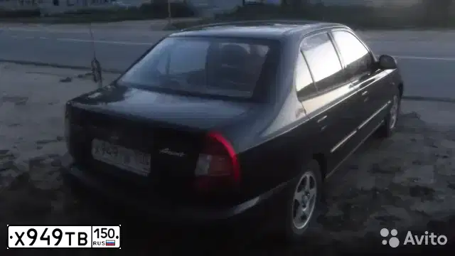 Фото автомобиля TAGAZ ACCENT, 2004 — госномер Х949ТВ150. Цвет: ЧЕРНЫЙ