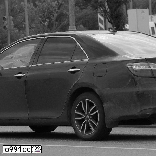 Фото автомобиля TOYOTA CAMRY, 2017 — госномер О991СС199. Цвет: ЧЕРНЫЙ МЕТАЛЛИК