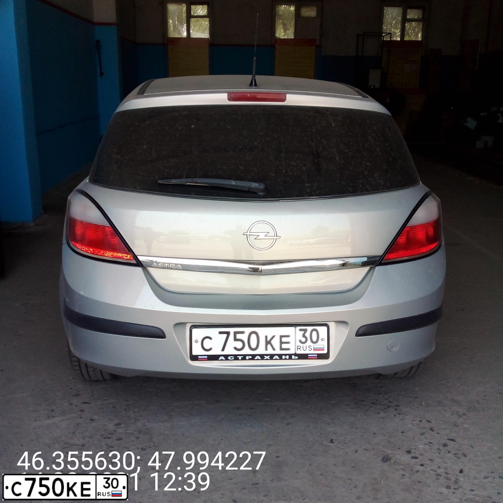 Фото автомобиля OPEL ASTRA, 2005 — госномер Е750ЕН30. Цвет: БЕЖЕВО-СЕРЫЙ