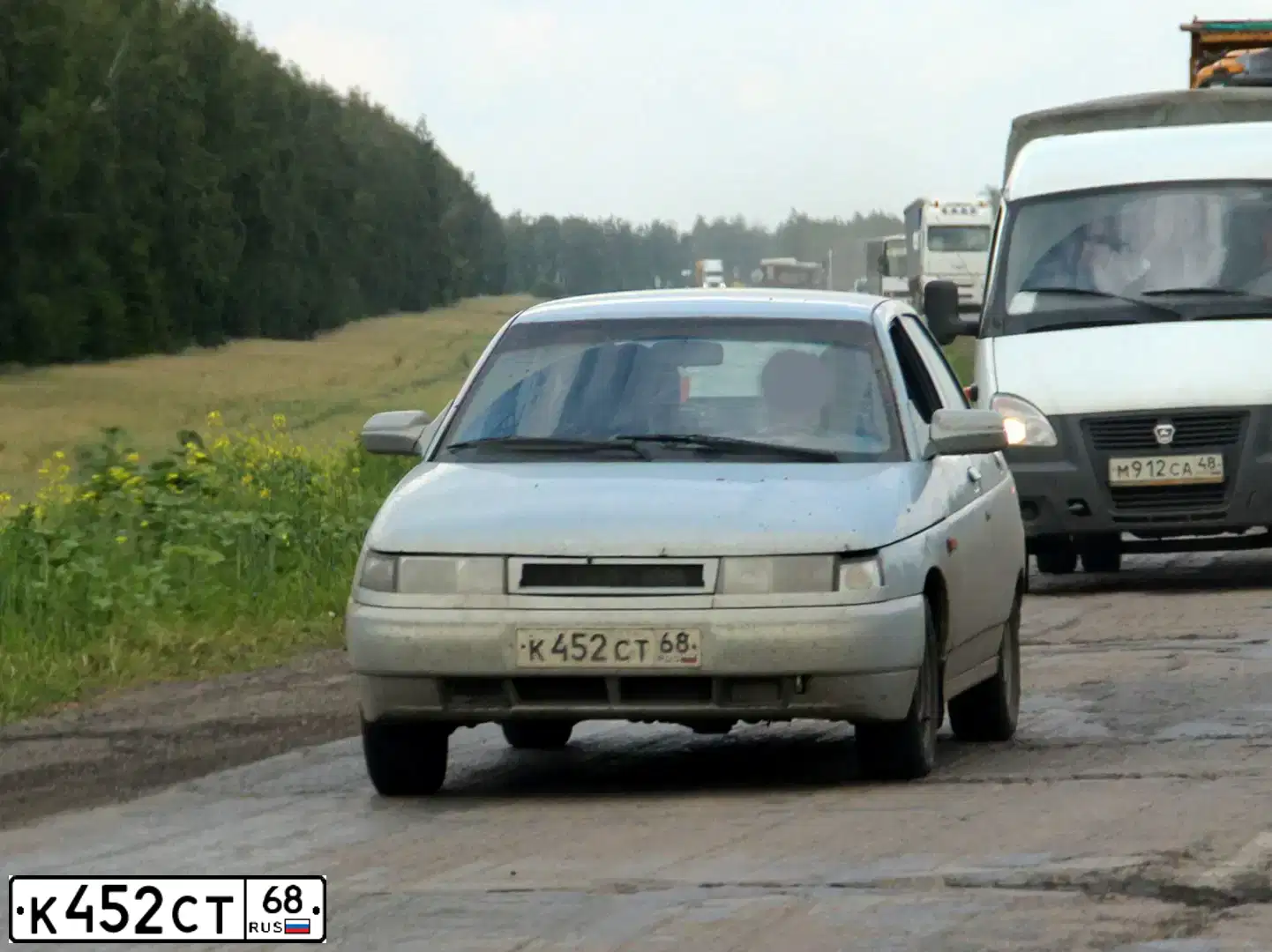 Фото автомобиля LADA 2112, 2004 — госномер К452СТ68. Цвет: СЕРЕБРИСТО-ЖЕЛТЫЙ