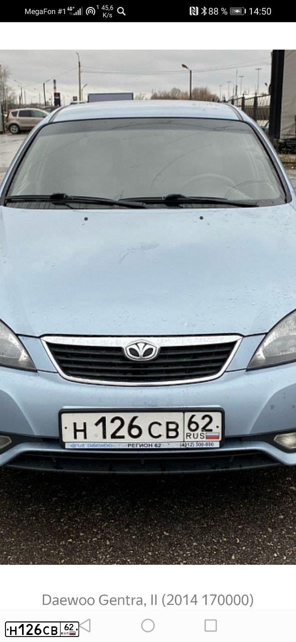 Фото автомобиля DAEWOO GENTRA, 2014 — госномер М819КЕ797. Цвет: СЕРО-ПЕРЛАМУТРОВЫЙ
