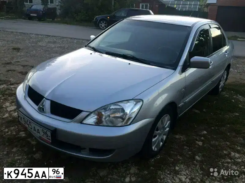 Фото автомобиля MITSUBISHI LANCER, 2007 — госномер К945АА96. Цвет: СЕРЫЙ