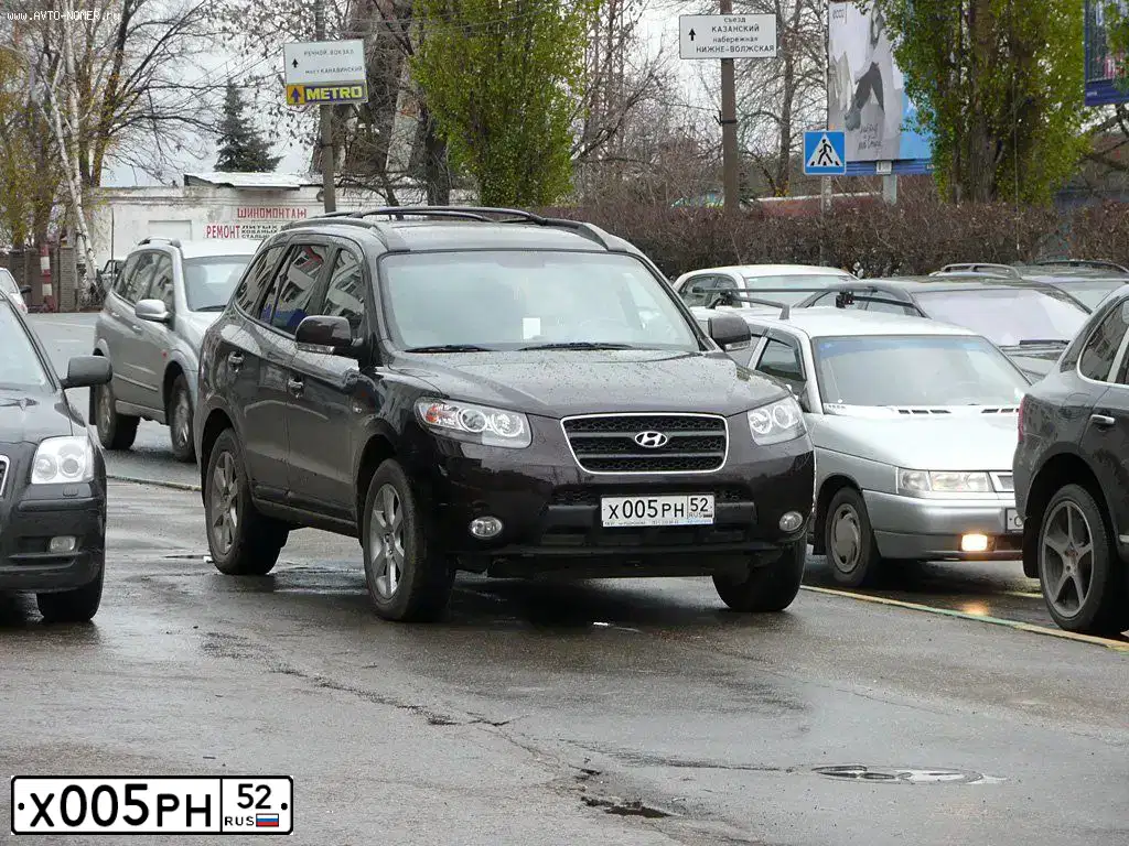 Фото автомобиля HYUNDAI SANTA FE, 2008 — госномер Х005РН152. Цвет: ТЕМНО-ВИШНЕВЫЙ