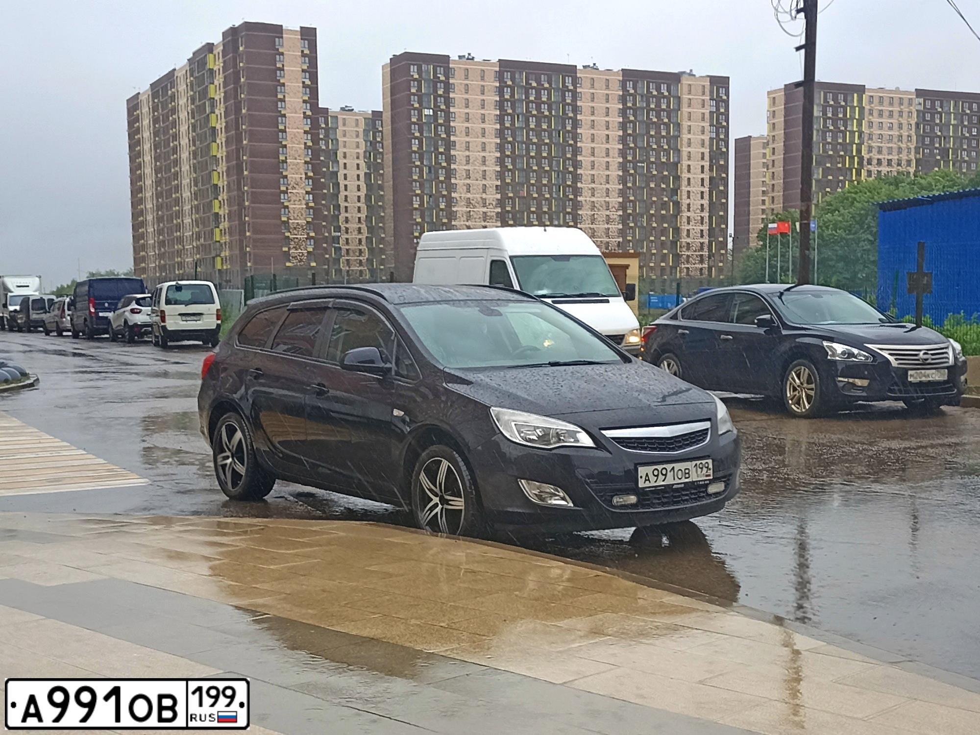 Фото автомобиля OPEL ASTRA, 2011 — госномер А991ОВ199. Цвет: ЧЕРНЫЙ