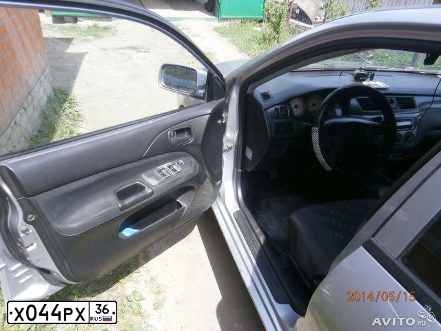 Фото автомобиля MITSUBISHI LANCER, 2005 — госномер У328ВТ48. Цвет: СЕРЕБРИСТЫЙ